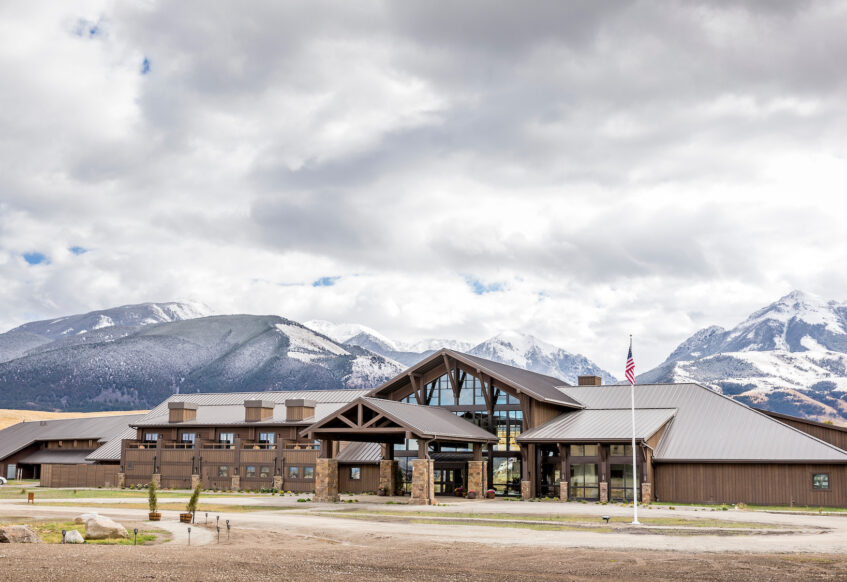 Exterior of the lodge with snowy mountains