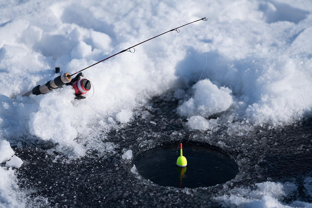 Ice Fishing Pole and a whole in ice