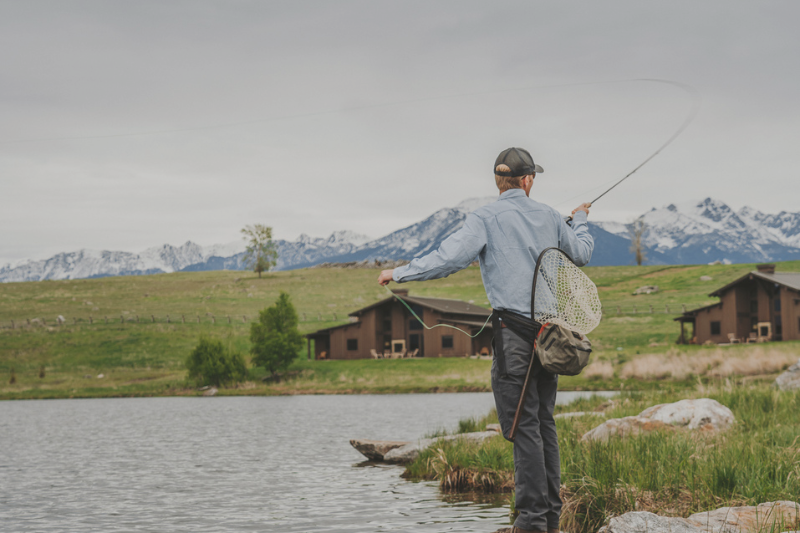 Man Fly Fishing on the Sage Lodge pond.