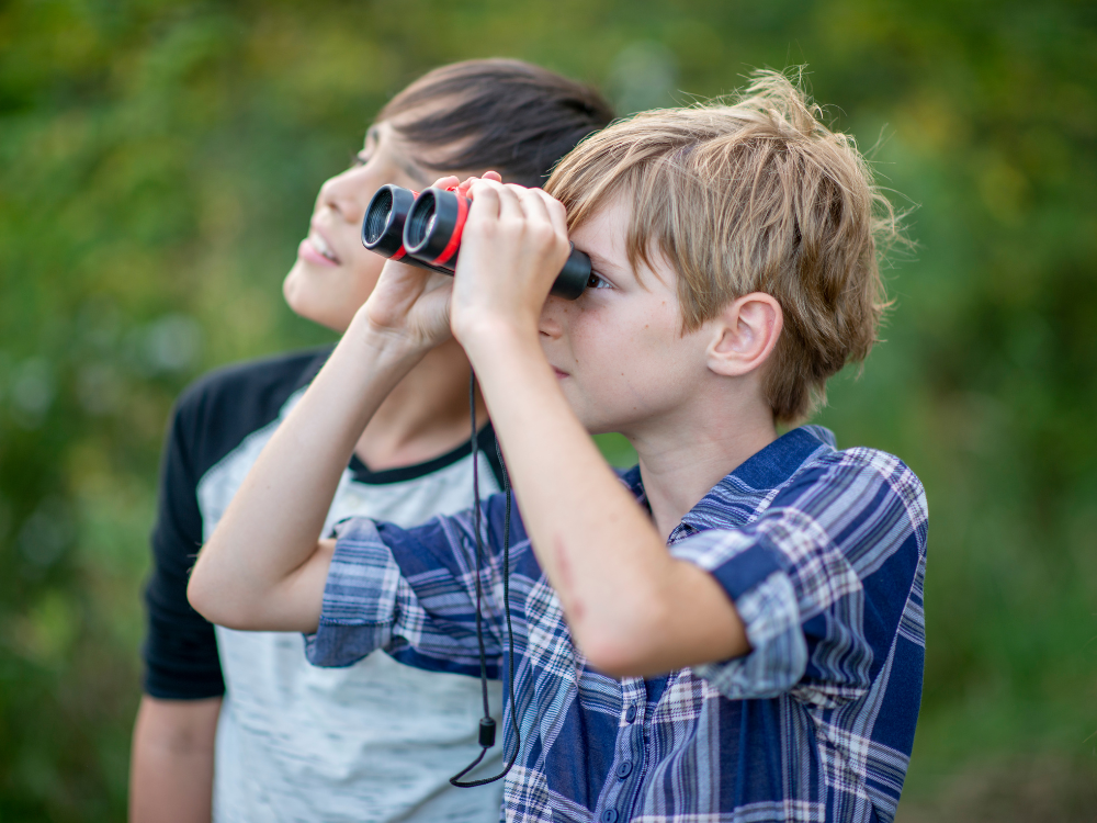 Kid with binoculars