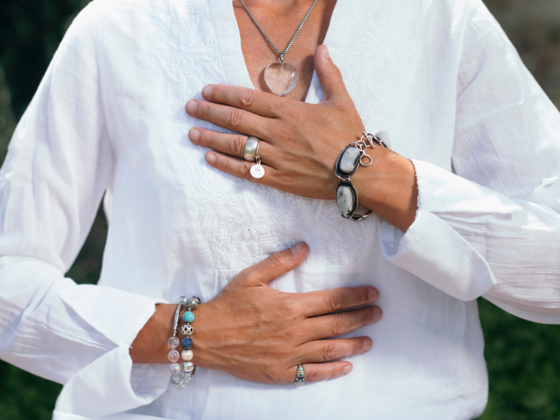 A woman meditating.